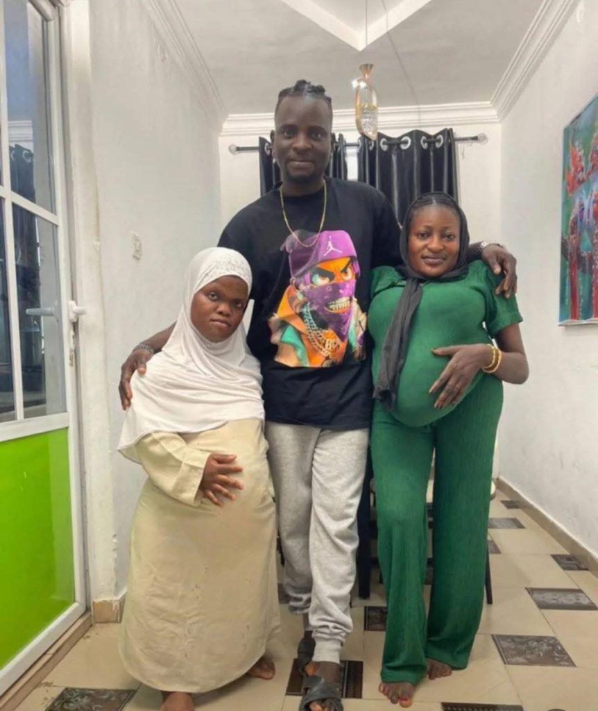 Man Sparks Reactions as Photo With Two Pregnant Partners Goes Viral